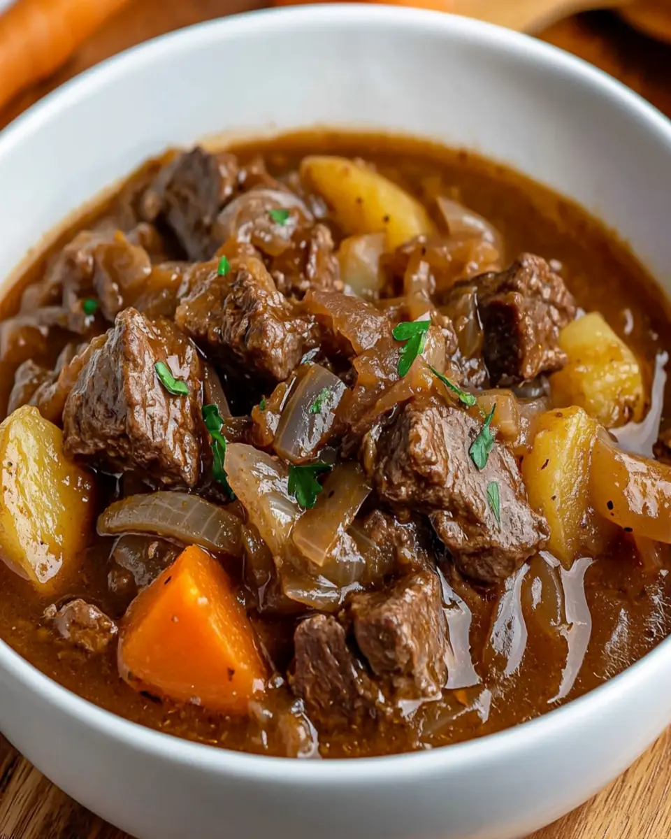 slow cooked beef stew with caramelized onions First Image First Image